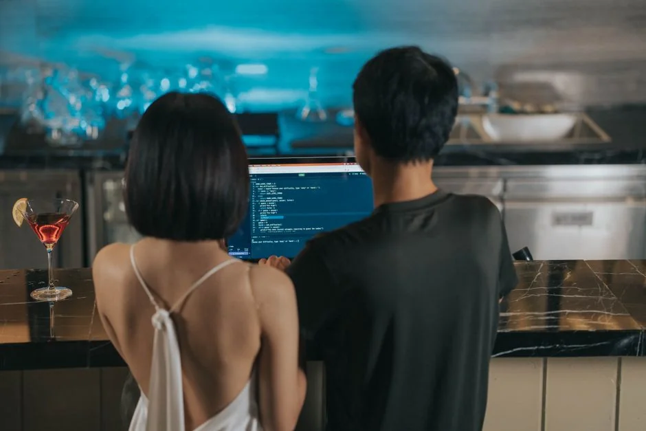 creative Stylish and efficient workspace with multiple monitors, laptop, and smartphone, showcasing a web design project.